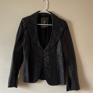 Black leather whipstitched fitted jacket with lapels